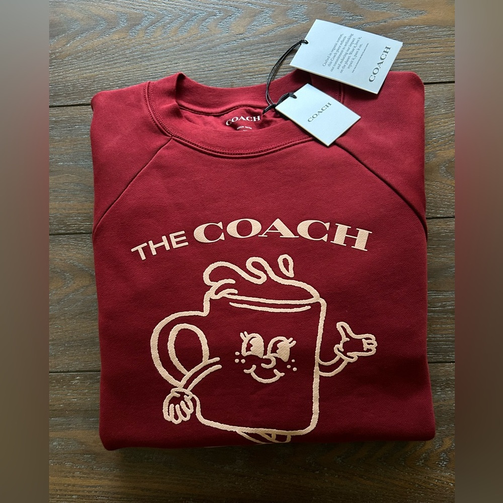 COACH Coffee Shop Lil Miss Jo Sweatshirt.  Womens size medium.   NEW
